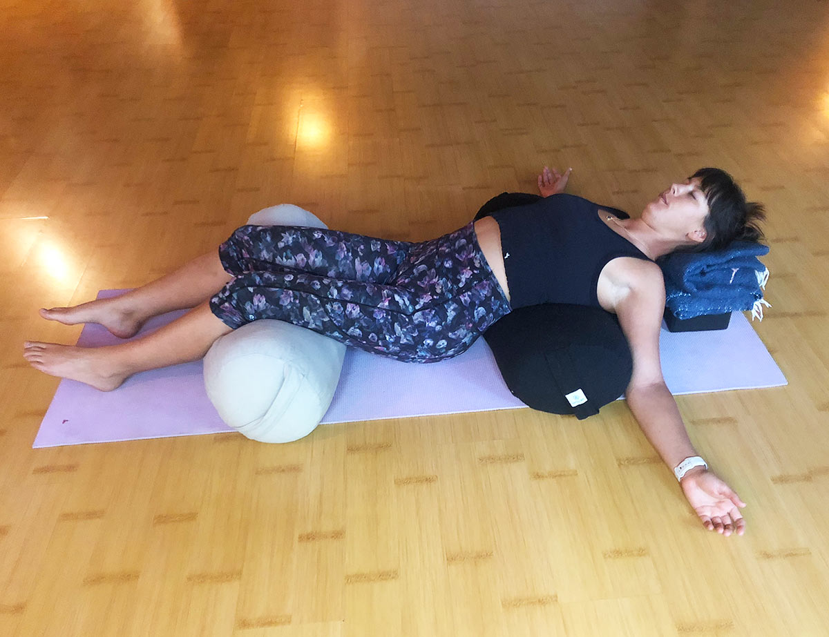 dbl-bolster Yoga in Maui Classes and Retreats offered by Wisdom Flow Yoga